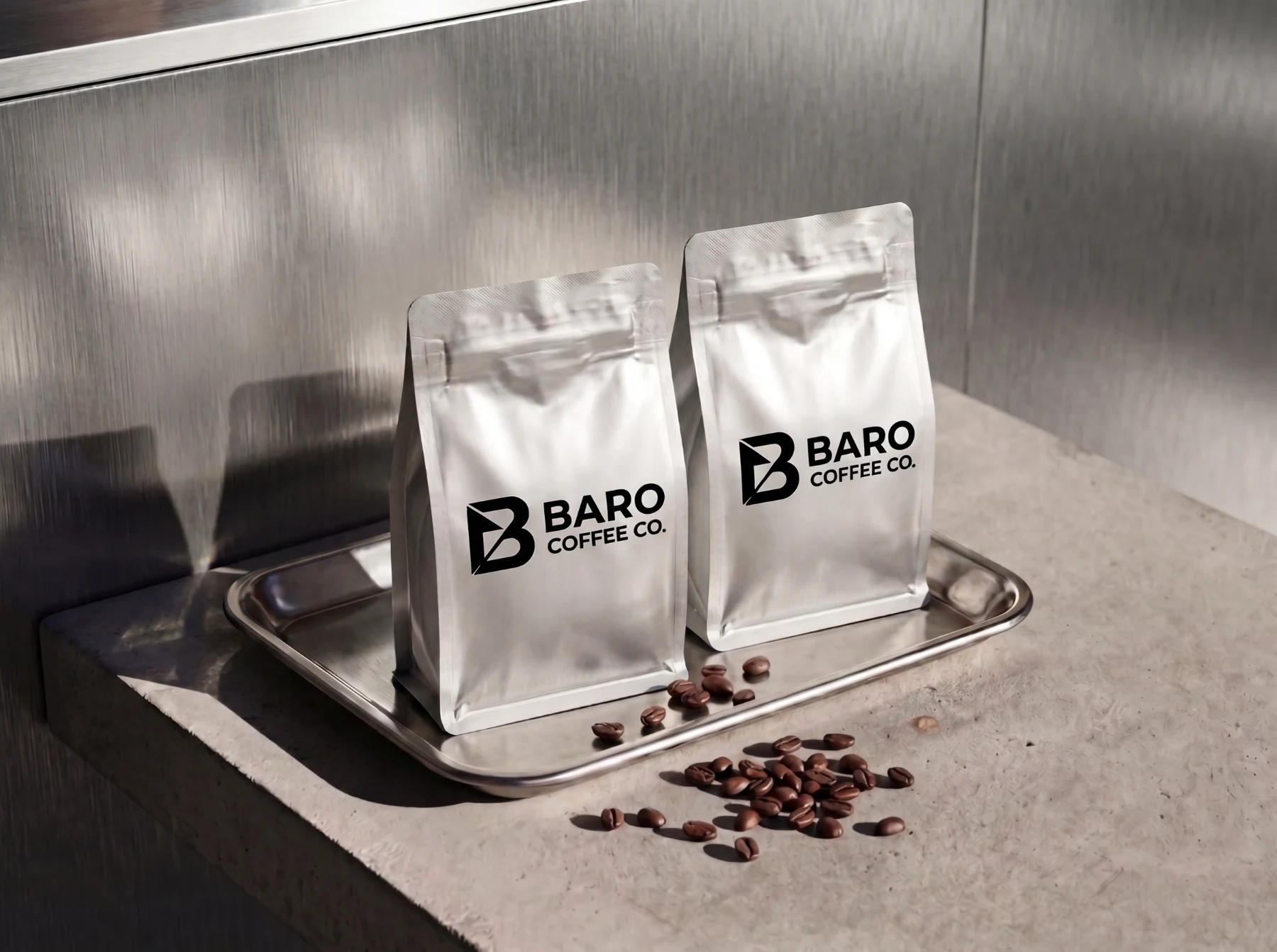 A BARO coffee bag on brushed steel with loose beans